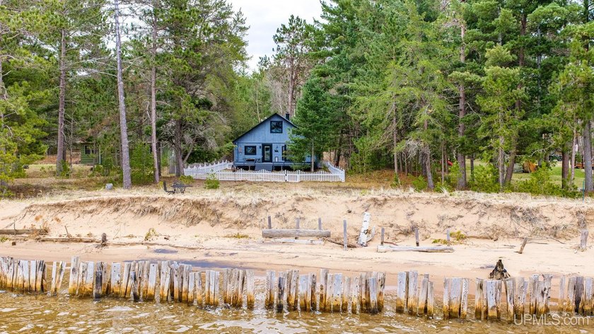 Stunning vacation property on the highly sought-after Huron Bay - Beach Home for sale in Skanee, Michigan on Beachhouse.com