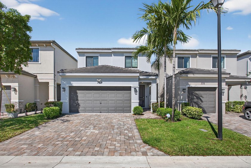 Experience elevated living in this sophisticated 3-bedroom, 2 - Beach Home for sale in Pompano Beach, Florida on Beachhouse.com
