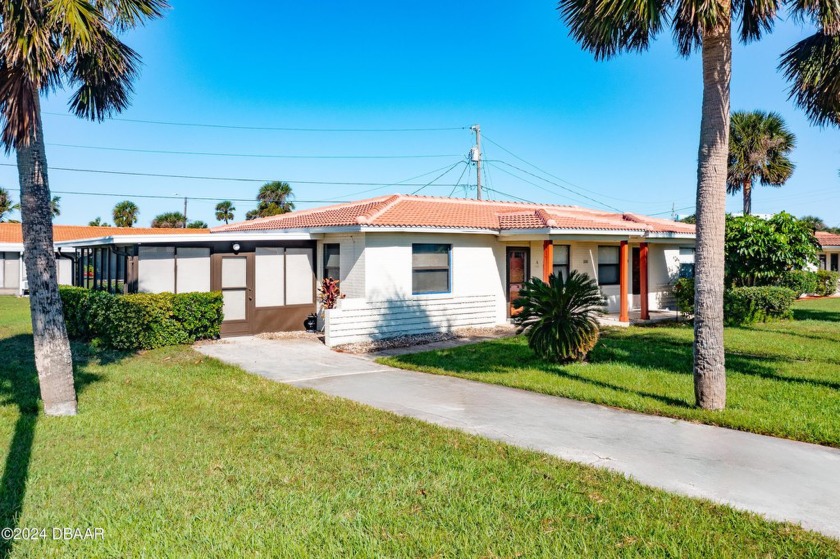 Outstanding...STEPS TO THE BEACH... Ocean Village Villa! This - Beach Home for sale in Ormond Beach, Florida on Beachhouse.com