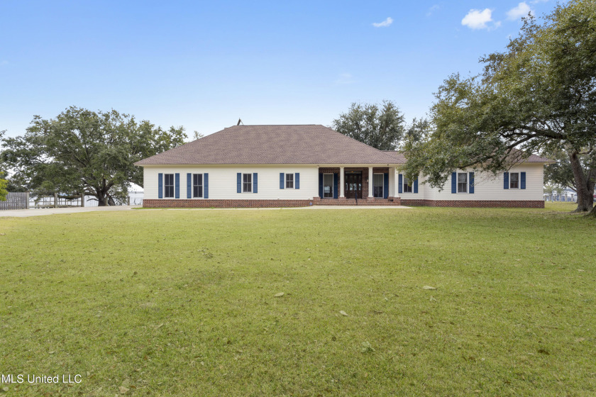Serenity at its finest...This one-of-a-kind back bay property - Beach Home for sale in D Iberville, Mississippi on Beachhouse.com