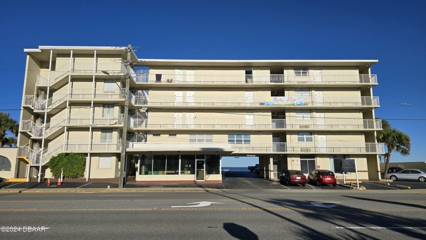 Nestled in a direct oceanfront building, this studio condotel in - Beach Lot for sale in Daytona Beach, Florida on Beachhouse.com