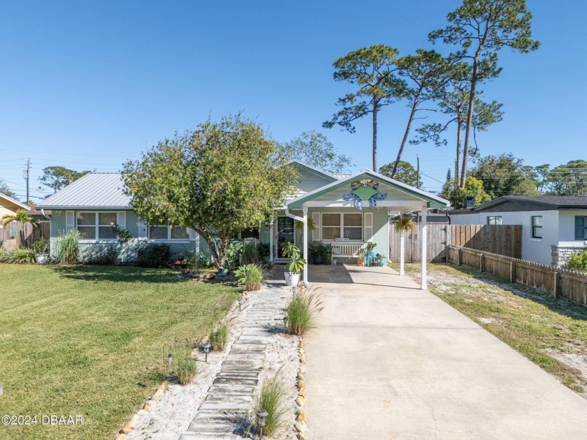 This charming 4 bedroom 2 bath home is nestled on a quiet street - Beach Home for sale in Daytona Beach, Florida on Beachhouse.com