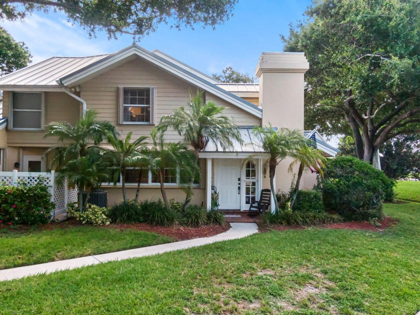 Impeccably updated 3-bedroom, 2-bath townhouse featuring a - Beach Townhome/Townhouse for sale in Boynton Beach, Florida on Beachhouse.com