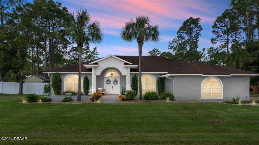 Welcome to your dream home in beautiful Palm Coast, FL! This - Beach Home for sale in Palm Coast, Florida on Beachhouse.com