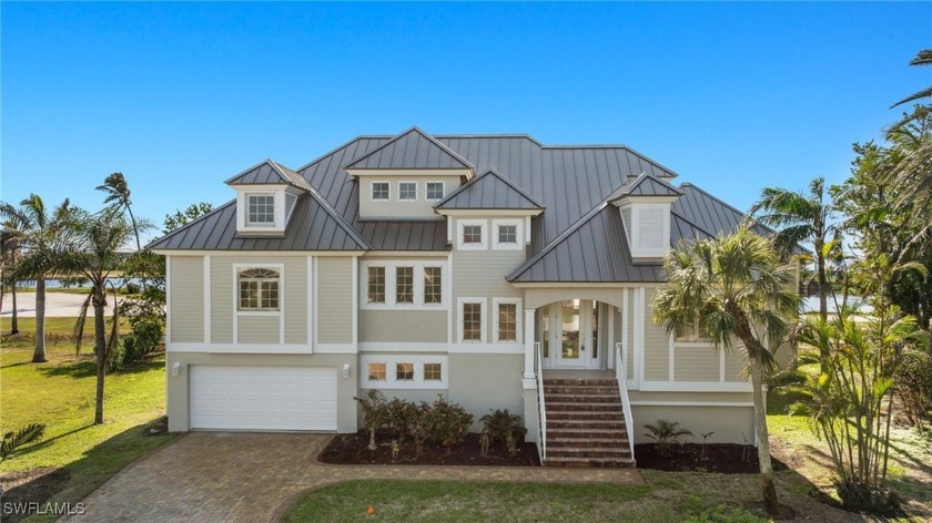 This custom 4 bedroom, 4.5 bath, remodeled pool home is located - Beach Home for sale in Sanibel, Florida on Beachhouse.com
