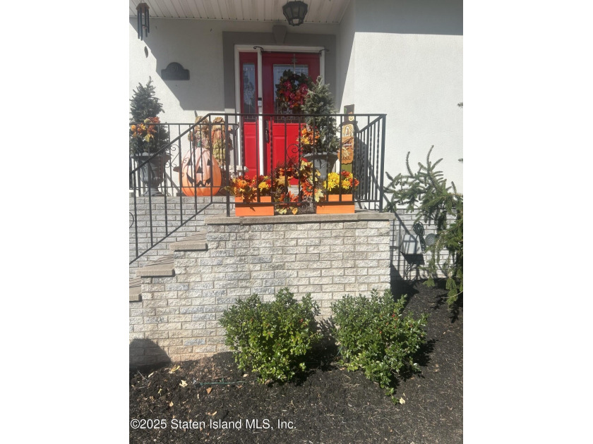 STEP INTO A LOVELY 2 FAMILY HOME, ON A TREE-LINED STREET, WITH A - Beach Home for sale in Staten Island, New York on Beachhouse.com