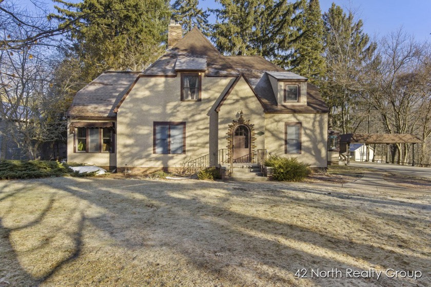 Do not miss this quality-built, character driven Tudor style - Beach Home for sale in Norton Shores, Michigan on Beachhouse.com