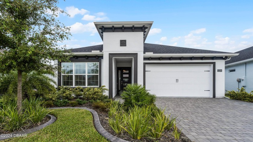 Welcome to this stunning 3-bedroom, 2-bath home in the gated - Beach Home for sale in Port Orange, Florida on Beachhouse.com