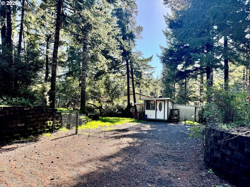 Enjoy your own slice of the Oregon coast with this level and - Beach Lot for sale in Florence, Oregon on Beachhouse.com