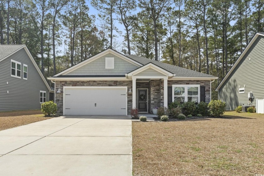 Step into this enchanting 3-bedroom, 2-bath home with additional - Beach Home for sale in Longs, South Carolina on Beachhouse.com