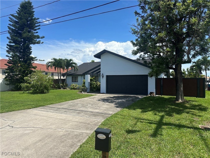 Live the Florida lifestyle in this spacious 3-bedroom, 2-bath - Beach Home for sale in Cape Coral, Florida on Beachhouse.com
