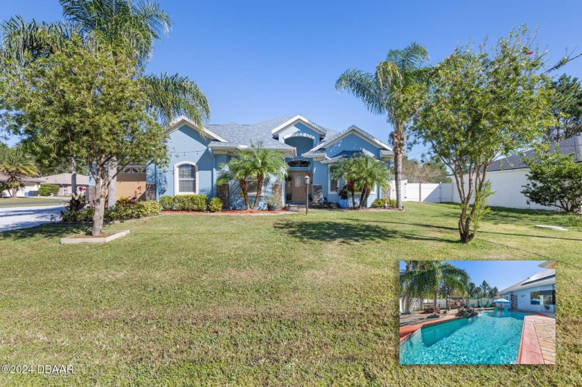 Stunning custom-built 4-bedroom, 3-bath, 3-car garage pool home - Beach Home for sale in Palm Coast, Florida on Beachhouse.com