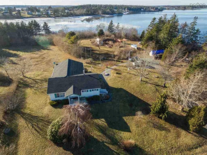 Nestled along the picturesque shores of Surettes Island, 1322 - Beach Home for sale in Surettes Island,  on Beachhouse.com