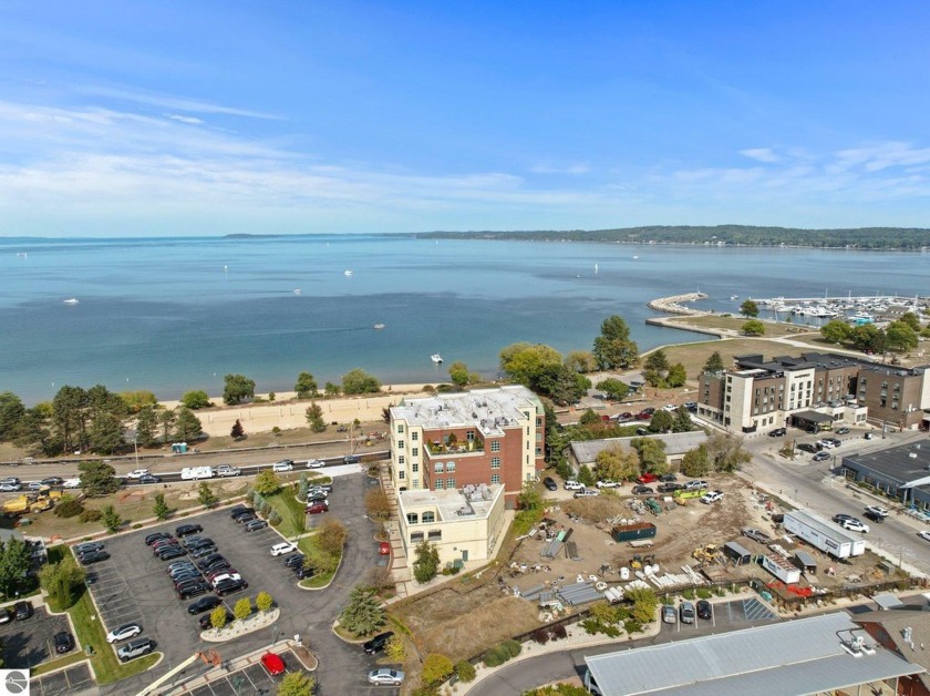 Step into luxury with this one-of-a-kind 3 bedroom, 3 bathroom - Beach Condo for sale in Traverse City, Michigan on Beachhouse.com