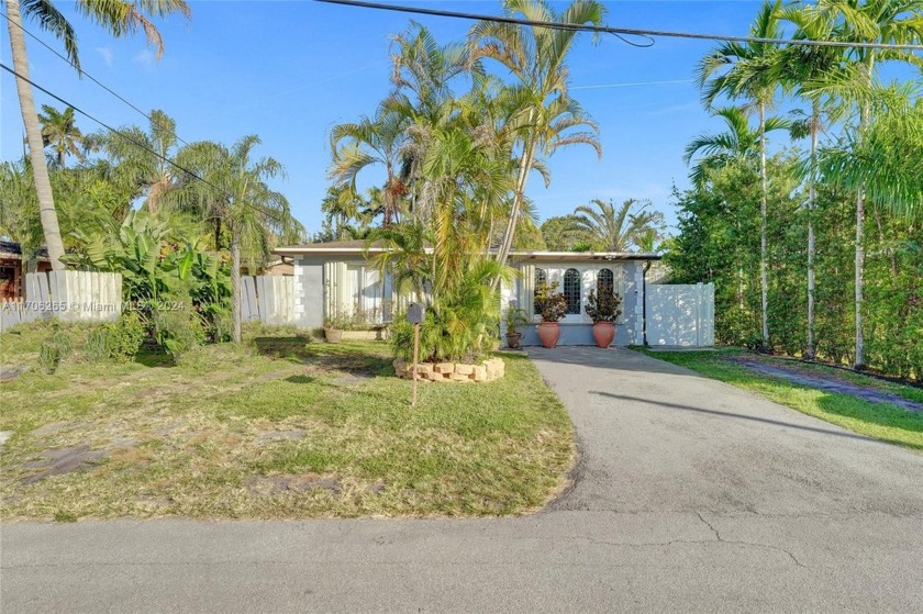 This beautifully remodeled 4 bedroom 3 bath home combines modern - Beach Home for sale in Hollywood, Florida on Beachhouse.com