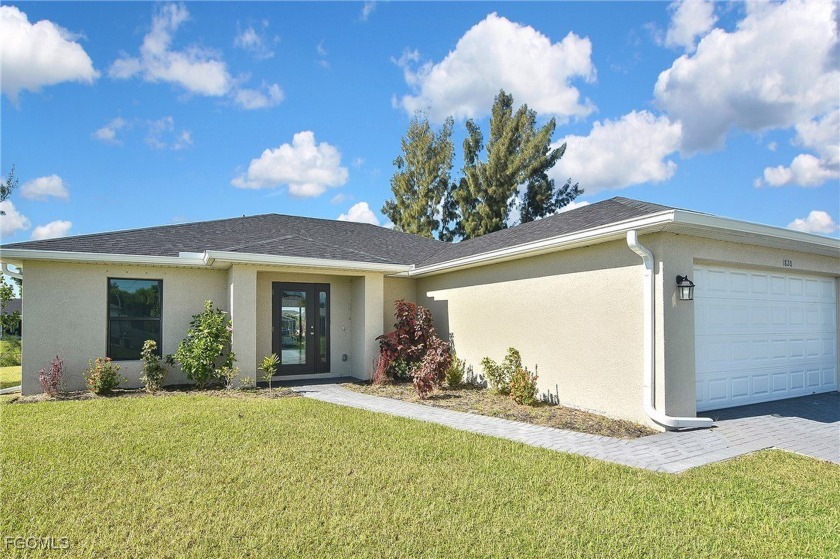 Discover this beautiful gorgeous waterfront home nestled on a - Beach Home for sale in Cape Coral, Florida on Beachhouse.com