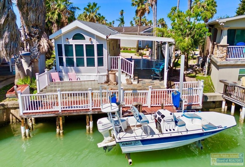 WATERFRONT CHARM meets investment potential at 714 E Clam Port - Beach Home for sale in Port Isabel, Texas on Beachhouse.com