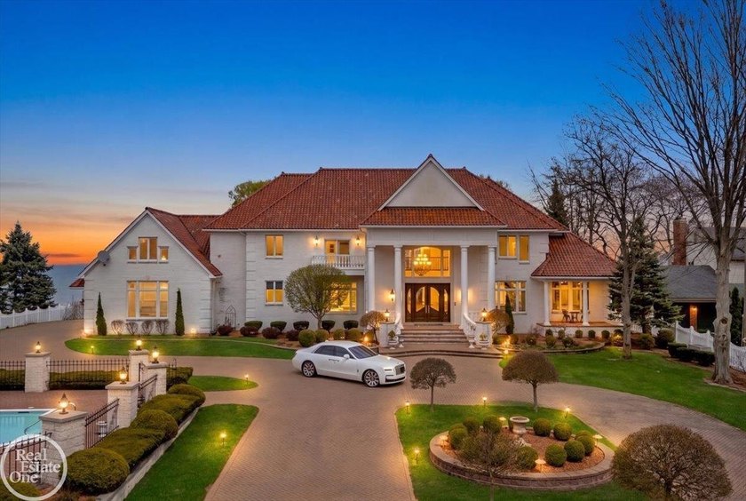 Welcome to an unparalleled lakefront estate offering 150 feet of - Beach Home for sale in Port Huron, Michigan on Beachhouse.com
