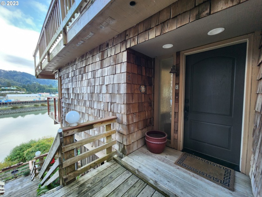 Indulge in the ultimate waterfront living experience with this - Beach Condo for sale in Brookings, Oregon on Beachhouse.com