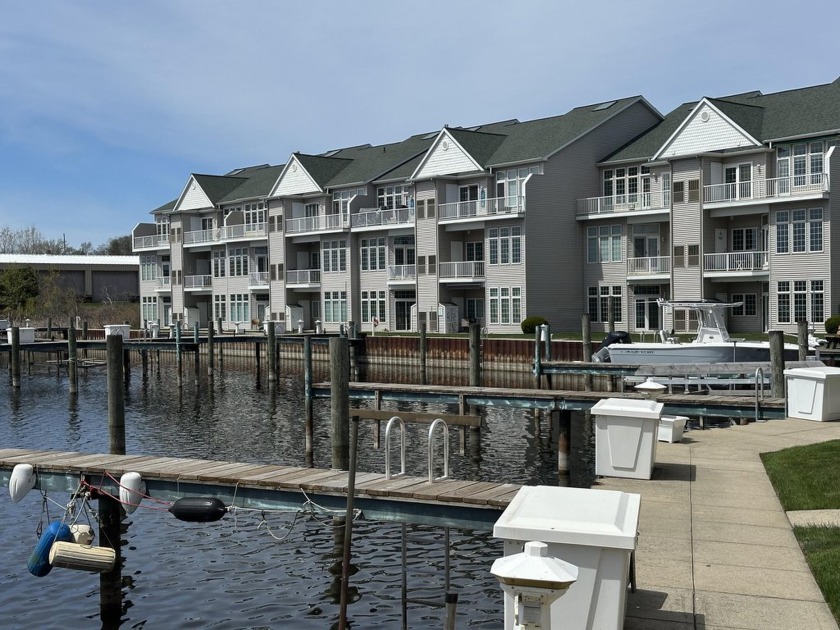 Looking for an affordable waterfront condo with a dock on - Beach Condo for sale in Muskegon, Michigan on Beachhouse.com