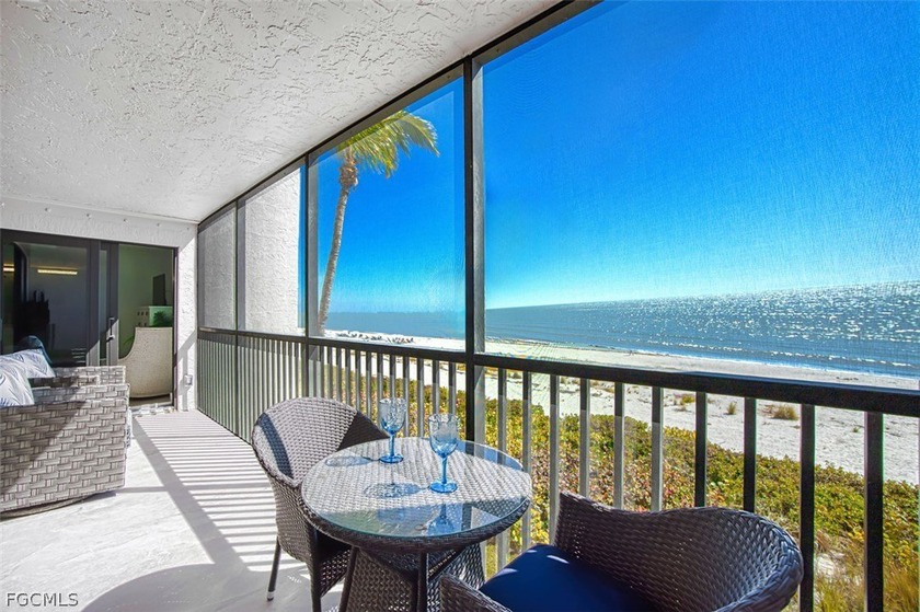 Step into coastal luxury with this impeccably rebuilt 2 bedroom - Beach Condo for sale in Sanibel, Florida on Beachhouse.com