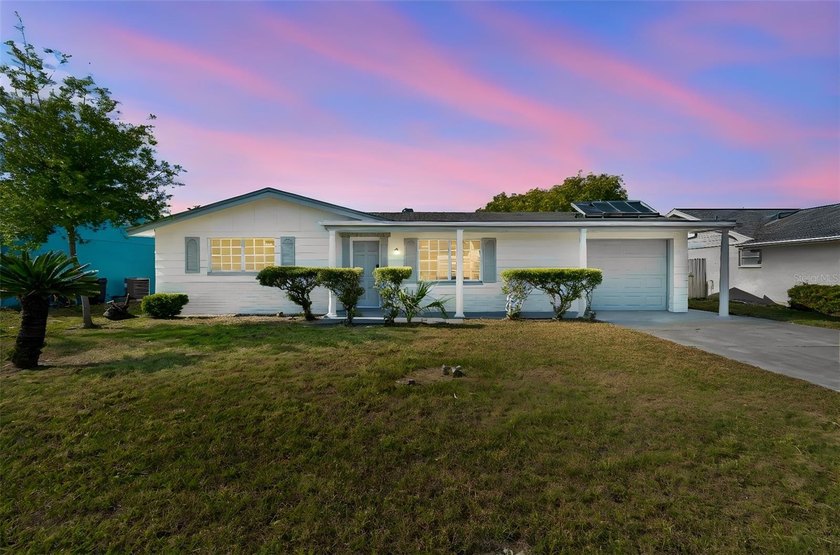 Coastal comfort, modern style, and everyday convenience come - Beach Home for sale in Holiday, Florida on Beachhouse.com