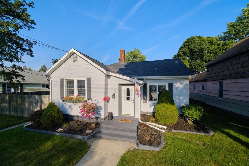 Charming, Renovated 3-Bedroom Home with Historic Firehouse Barn - Beach Home for sale in Manistee, Michigan on Beachhouse.com