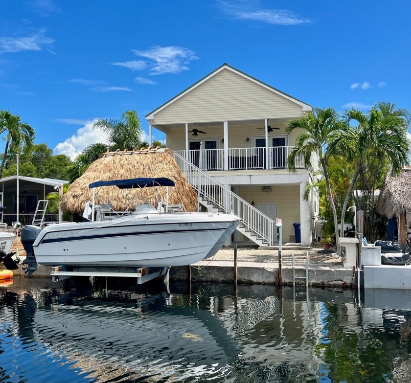 Indulge in waterfront luxury living at the prestigious Crosskey - Beach Home for sale in Key Largo, Florida on Beachhouse.com