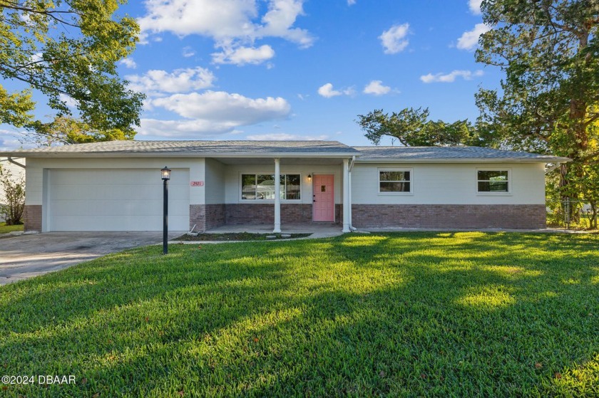 This beautifully updated 4-bedroom, 2-bath home is located just - Beach Home for sale in South Daytona, Florida on Beachhouse.com