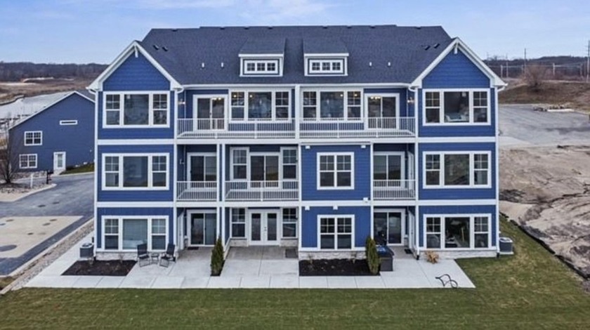 Imagine owning a serene waterfront condo in a maintenance-free - Beach Condo for sale in Portage, Indiana on Beachhouse.com