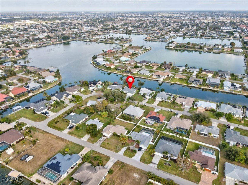 Waterfront Pool Home | 3 Bed + 2 Bath + 3 Car Garage | Wide - Beach Home for sale in Cape Coral, Florida on Beachhouse.com
