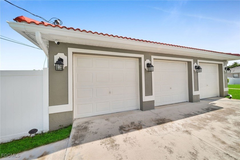 This spacious 4 bedroom, 3.5 bath residence with a 3-car garage - Beach Home for sale in Cape Coral, Florida on Beachhouse.com
