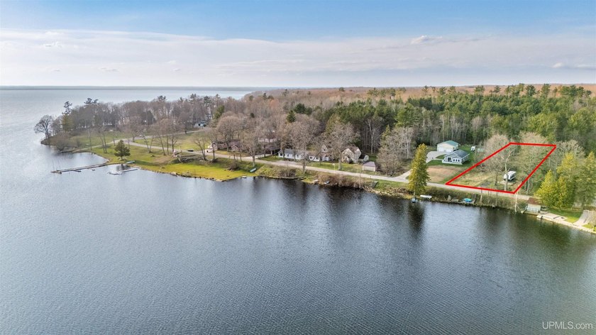Sitting on over 1 acre of land, and with 100 feet of frontage on - Beach Lot for sale in Manistique, Michigan on Beachhouse.com