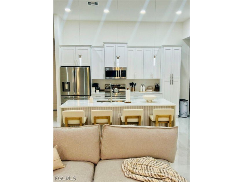 Welcome to this stunning new construction home built in 2024 - Beach Home for sale in Cape Coral, Florida on Beachhouse.com