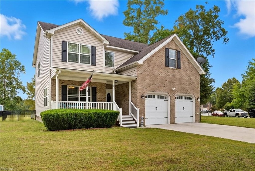 Beautiful brick lakefront home offering modern comfort and style - Beach Home for sale in Suffolk, Virginia on Beachhouse.com