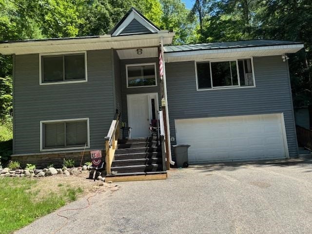 This very nice home is in the Village of Walloon Lake, within - Beach Home for sale in Walloon Lake, Michigan on Beachhouse.com