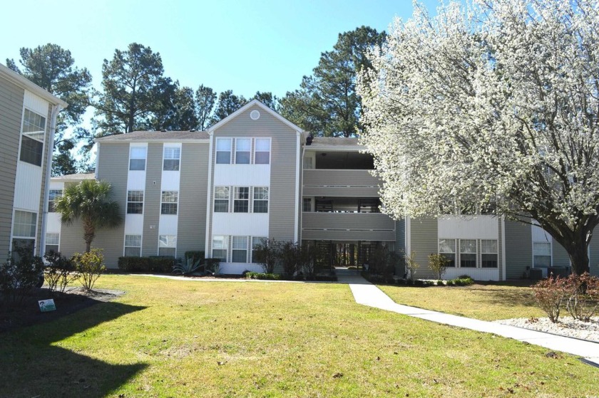WHAT A CREAM PUFF! This spacious top floor beautiful move-in - Beach Condo for sale in Surfside Beach, South Carolina on Beachhouse.com