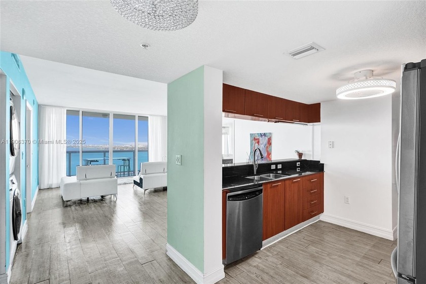 Experience breathtaking, direct east-facing views that stretch - Beach Condo for sale in Miami, Florida on Beachhouse.com