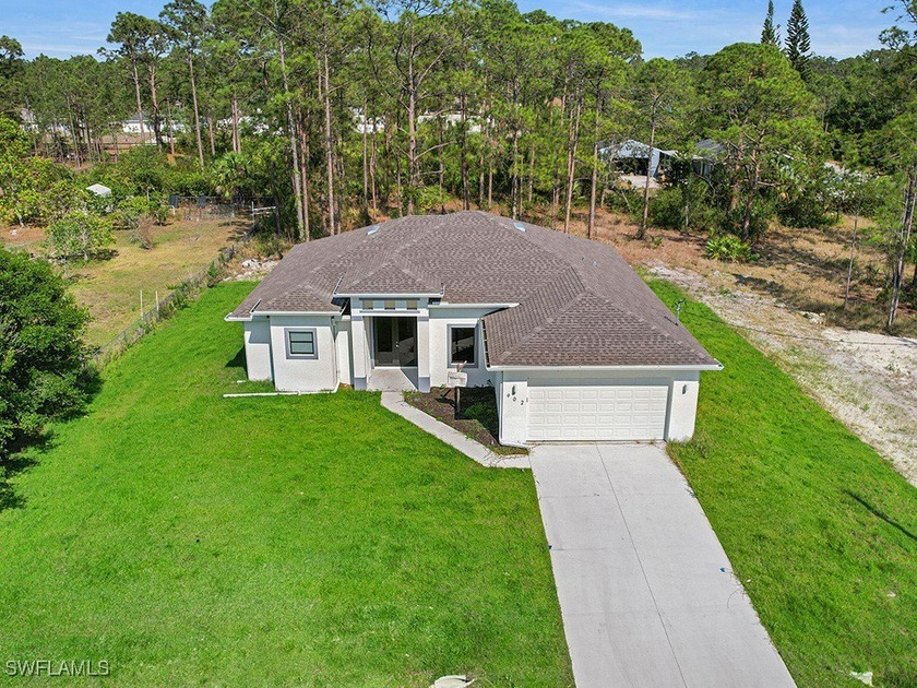 NEW CONSTRUCTION 3 bedroom+ den, 2 bath spacious home. SELLER - Beach Home for sale in Lehigh Acres, Florida on Beachhouse.com
