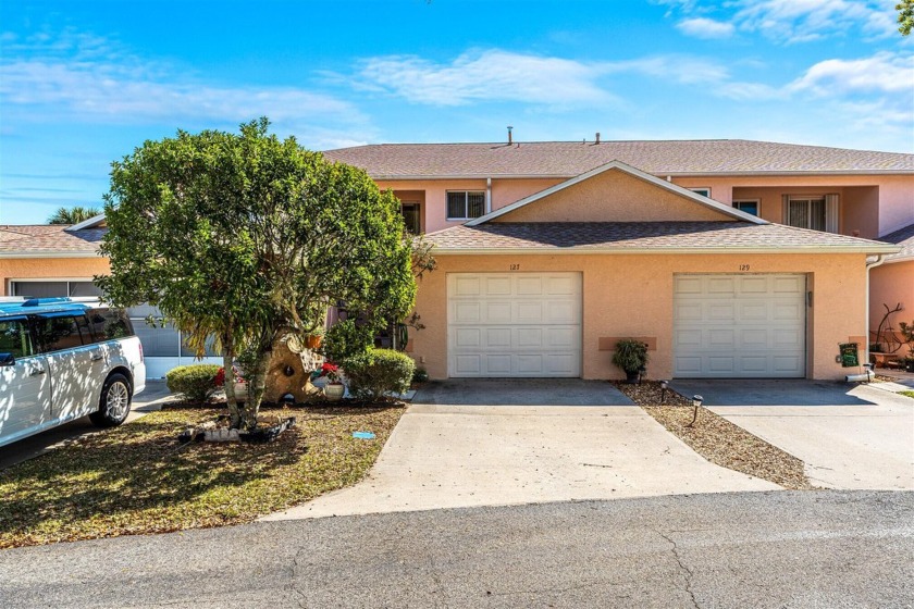 Nestled within the tranquil confines of a gated community along - Beach Condo for sale in Rockledge, Florida on Beachhouse.com