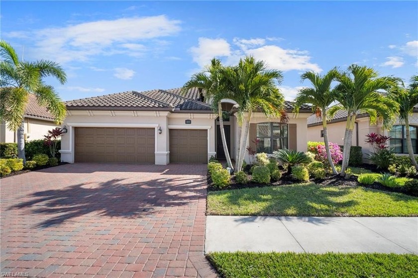 Set against tranquil lake views in highly sought-after Bonita - Beach Home for sale in Bonita Springs, Florida on Beachhouse.com