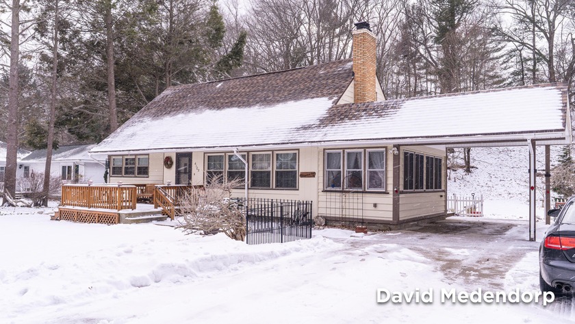 Welcome to 4105 Lake Harbor Road in Norton Shores! Located just - Beach Home for sale in Norton Shores, Michigan on Beachhouse.com