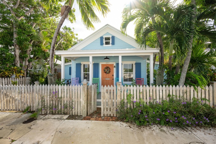 This colorful circa 1899 Historic Conch house sits behind large - Beach Home for sale in Key West, Florida on Beachhouse.com