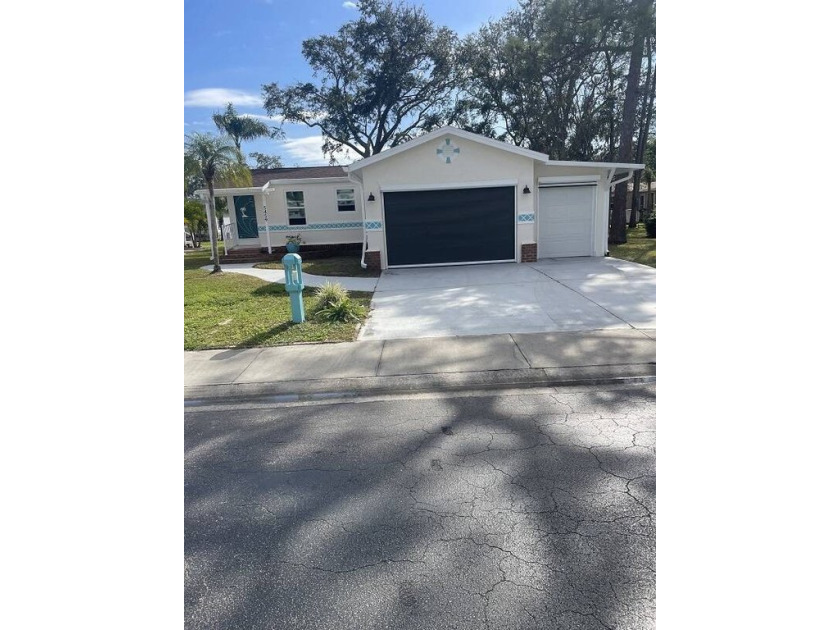 The Lot Rent for this home is $1,037.00/monthly.    This updated - Beach Home for sale in North Fort Myers, Florida on Beachhouse.com