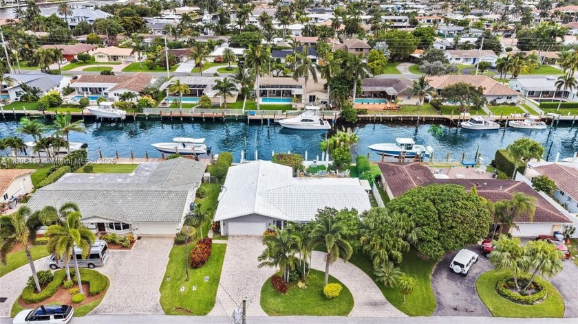 Step into this waterfront gem! This 3-bed, 2-bath home is a - Beach Home for sale in Pompano Beach, Florida on Beachhouse.com