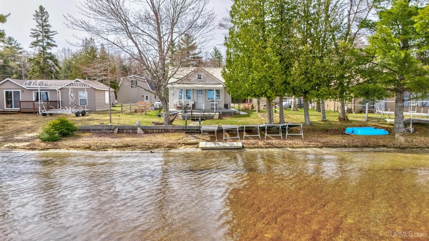 Enjoy peaceful waterfront living with this cute and cozy - Beach Home for sale in Gulliver, Michigan on Beachhouse.com