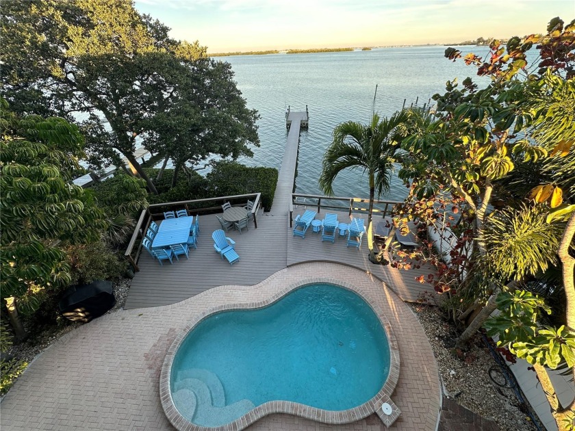 Located on Sarasota Bay, this updated four-bedroom, 5.5-bath - Beach Home for sale in Bradenton Beach, Florida on Beachhouse.com