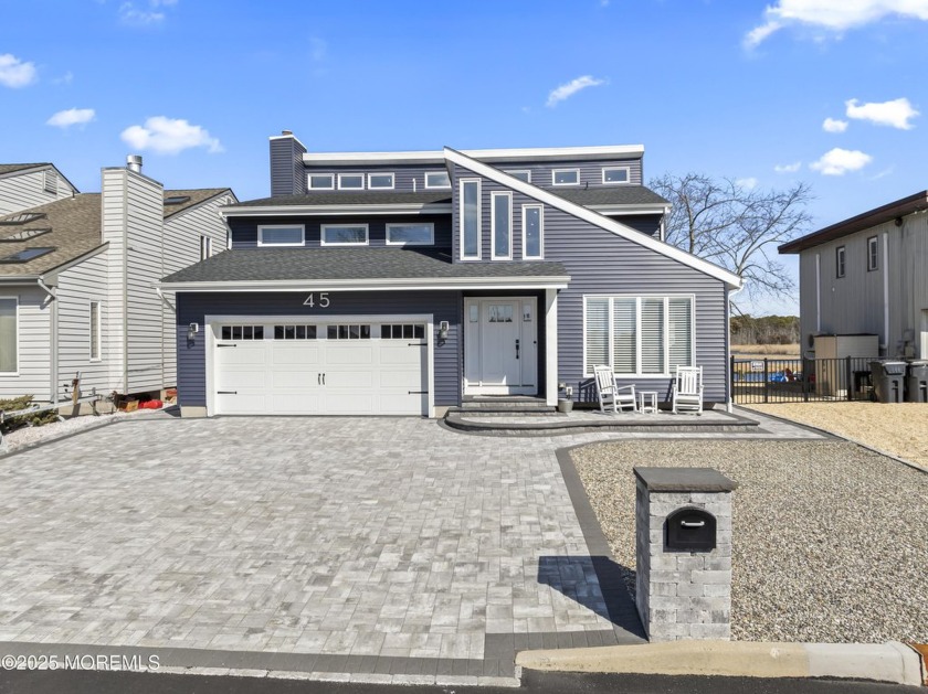 Presenting a waterfront sanctuary in Brick, NJ. This exquisite 4 - Beach Home for sale in Brick, New Jersey on Beachhouse.com