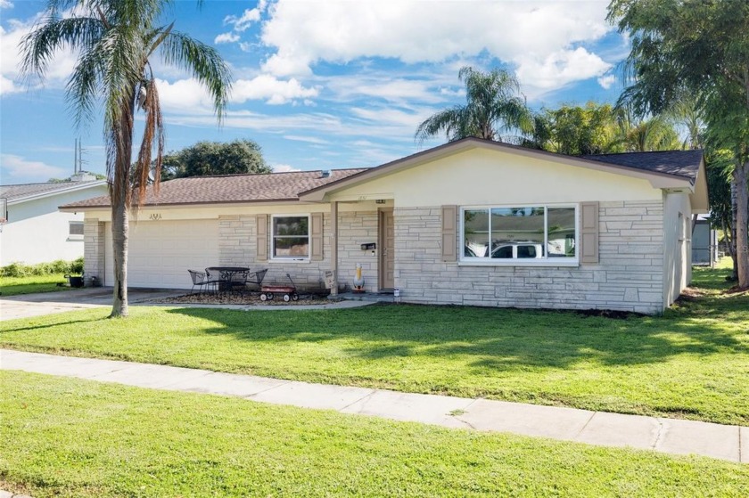 Tastefully renovated 4-bedroom, 2-bathroom home with a 2-car - Beach Home for sale in Clearwater, Florida on Beachhouse.com