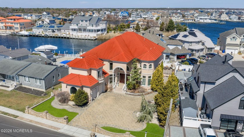 Discover a rare Mediterranean inspired masterpiece in the - Beach Home for sale in Toms River, New Jersey on Beachhouse.com